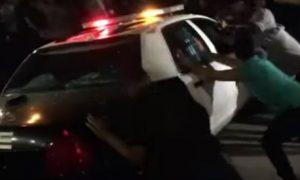 Anti-Trump Protesters Attack Cop Car Outside California Rally
