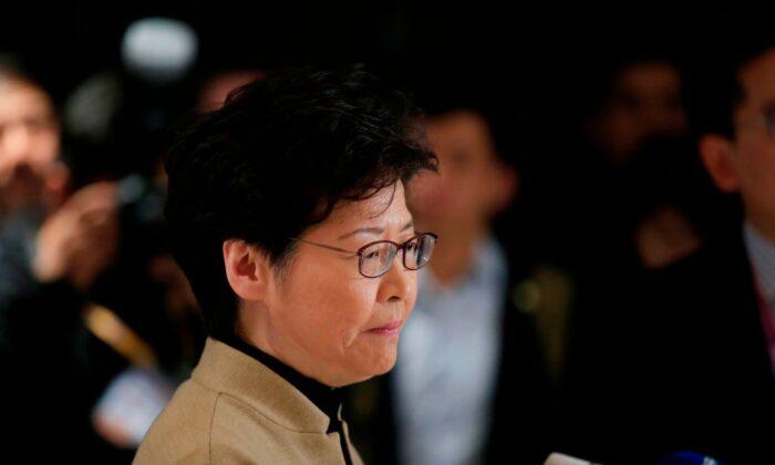 China’s Top Official Overseeing Hong Kong Affairs Voices Support for Carrie Lam
