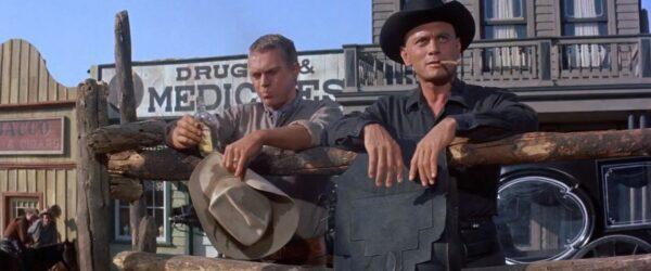  One by one, gunmen join the cause. Steve McQueen (L) and Yul Brynner in “The Magnificent Seven.” (United Artists)