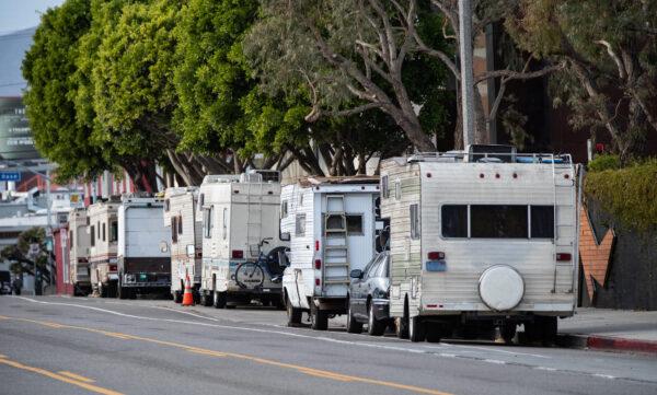 Recreational vehicles park along the street in the Venice area of Los Angeles on Jan. 27, 2021. (John Fredricks/The Epoch Times)