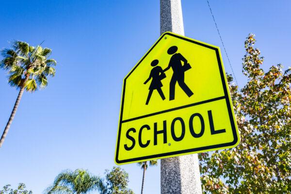 In this file photo, a sign is seen near Sonora Elementary School, in Costa Mesa, Calif., on Dec. 1, 2020. (John Fredricks/The Epoch Times)