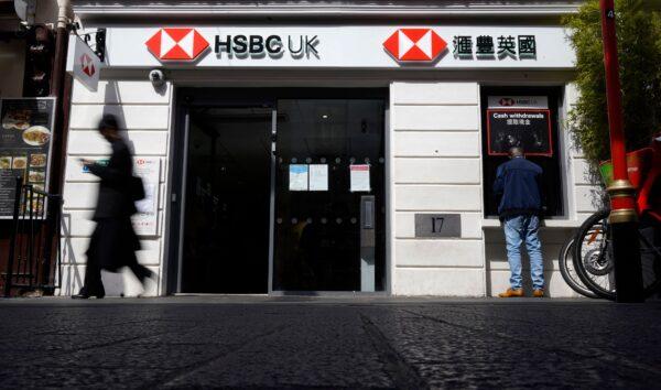 A pedestrian walks past a branch of a HSBC bank in central London on April 26, 2022. (Niklas Halle'n/AFP via Getty Images)