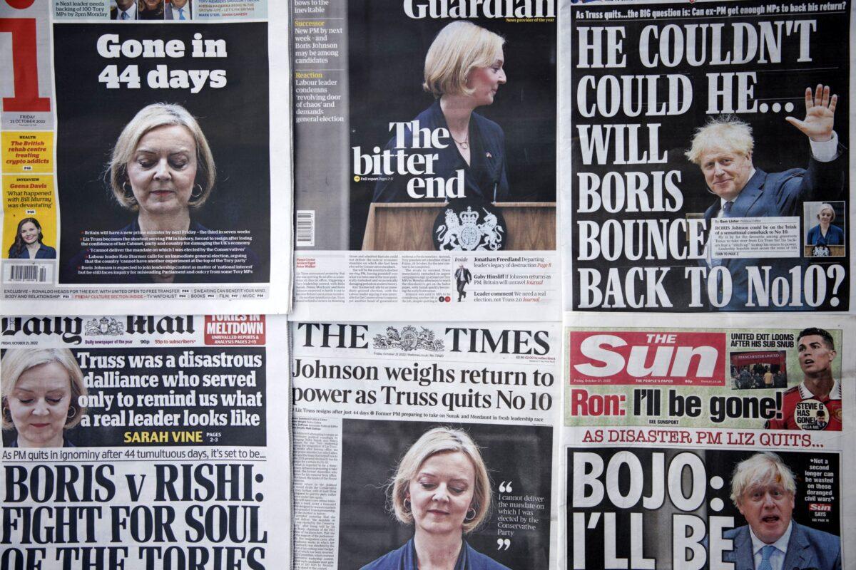 A selection of the front pages of British national newspapers showing the reaction to the resignation of Prime Minister Liz Truss, in central London on Oct. 21, 2022. (David Cliff/AP Photo)