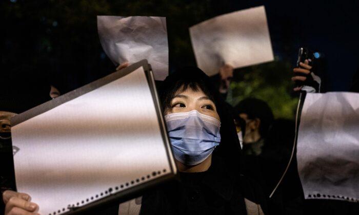 Protest Against China’s COVID Lockdowns in New York City, Urumqi Fire Victims Mourned