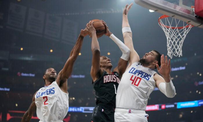 Mann, Leonard Lead Clippers Over Last-Place Rockets 121–100
