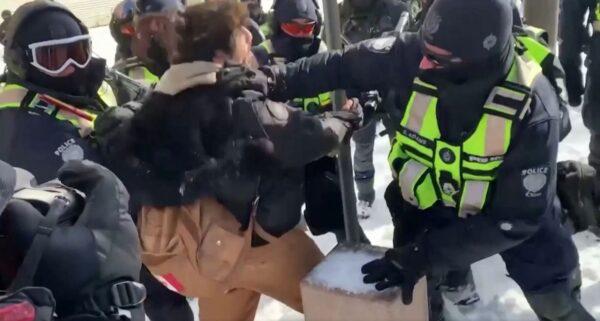  Canadian police and protesters in “The Shadow State.” (Epoch Original)