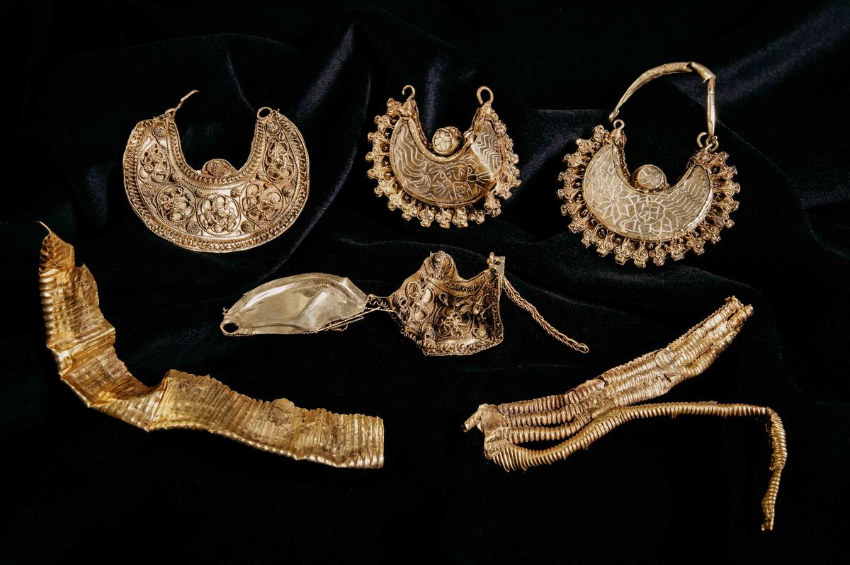  Part of the 1,000-year-old medieval treasure discovered in Hoogwoud, Netherlands, consisting of jewelry and silver coins, is shown in this undated handout picture obtained by Reuters. (Archeologie West-Friesland/Handout via REUTERS)