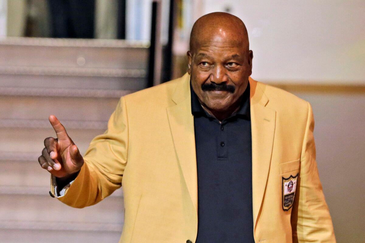Jim Brown is introduced before the inaugural Pro Football Hall of Fame Fan Fest at the International Exposition Center in Cleveland on May 2, 2014. (Mark Duncan/AP Photo)