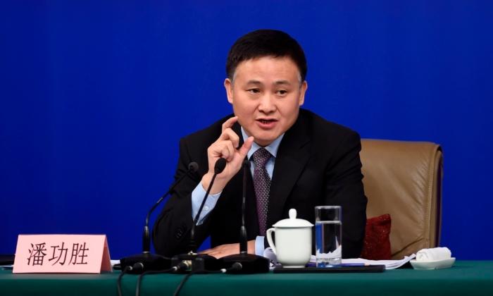 China Appoints New Central Bank Leader Amid Economic Woes