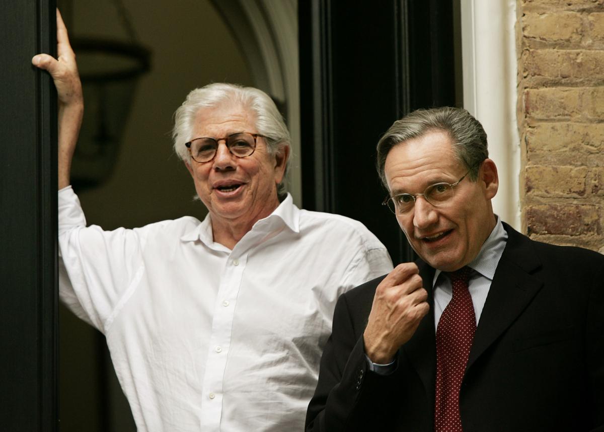 Washington Post reporters Carl Bernstein (L) and Bob Woodward speak to members of the media from the steps of Mr. Woodward's house in the Georgetown neighborhood of Washington, on June 1, 2005. (Win McNamee/Getty Images)