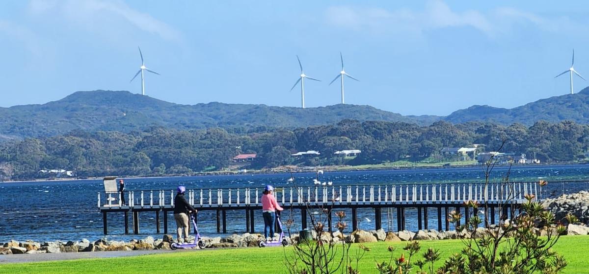 Wind turbines can be seen on the skyline in Albany, Western Australia, on Aug. 8, 2023. (Susan Mortimer/The Epoch Times)