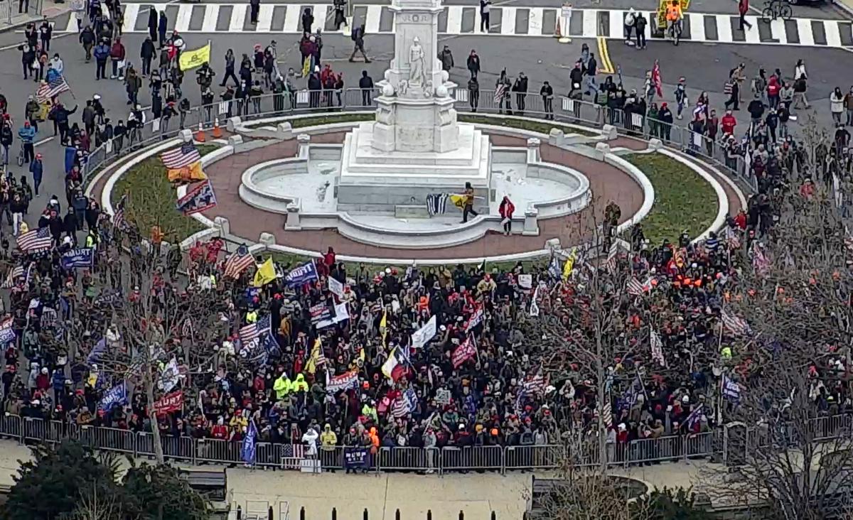 Hundreds of protesters amass just east of the Peace Memorial, shortly before breaching police barricades on Jan. 6, 2021. (U.S. Capitol Police/Screenshot via The Epoch Times)