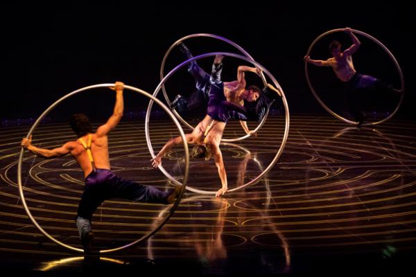  Giant rings circle at dizzying speeds in "Corteo." (Maja Prgomet/Cirque du Soleil 2023)