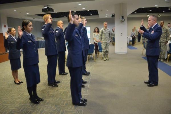 Eight enlisted members become non-commissioned officers at the Schriever Space Complex during the Space and Missile Systems Center’s Senior NCO Induction ceremony, on Dec 6, 2017.  (Van Ha/U.S. Space Force)