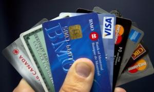 Americans Paid Record-High $130 Billion in Credit Card Interest and Fees Amid Fed Rate Hikes