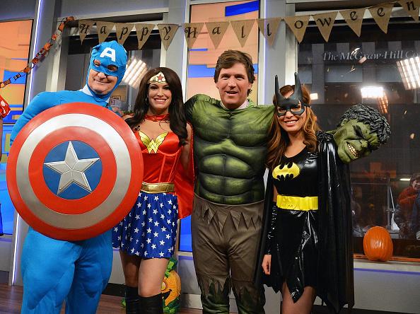  (L-R) "Fox & Friends" co-hosts and contributors Steve Doocy as Captain America, Kimberly Guilfoyle as Wonder Woman, Tucker Carlson as The Incredible Hulk, and Maria Molina as Bat Girl attend "Fox & Friends" 2014 Halloween celebration on Oct. 31, 2014, in New York. (Slaven Vlasic/Getty Images)