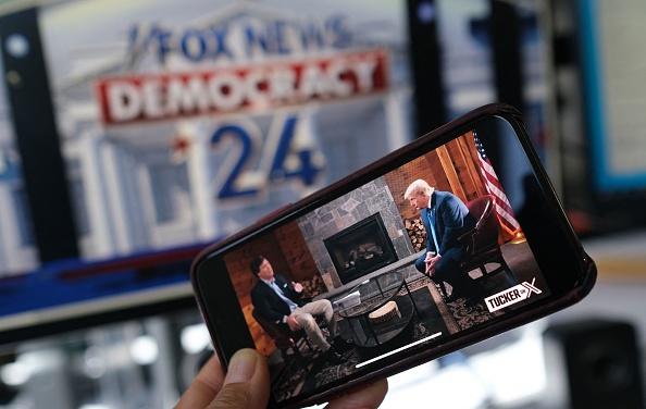  A preview of Tucker Carlson's interview of former U.S. President Donald Trump scheduled to air on X (formerly Twitter) on the same night as the first Republican presidential primary debate in Milwaukee, on Aug. 23, 2023. (Chris Delmas/AFP via Getty Images)