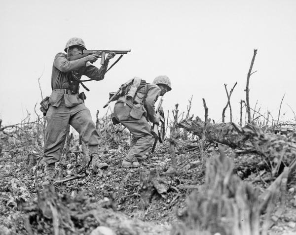  Two Marines from the 2nd Battalion, 1st Marine Regiment during fighting at Wana Ridge during the Battle of Okinawa, May 1945. (Public Domain)
