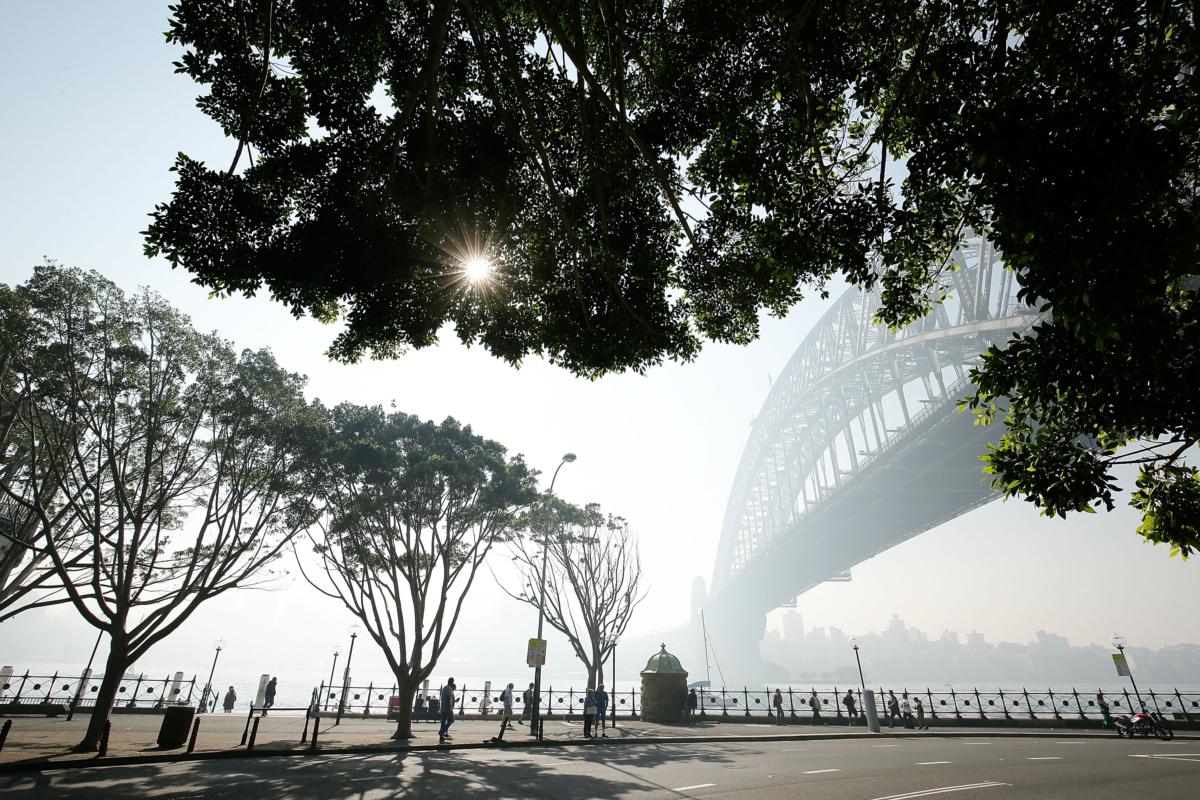  A thick cloud caused by hazard reduction burning in the Blue Mountains blankets the Sydney Harbour Bridge in Australia. (Mark Metcalfe/Getty Images)