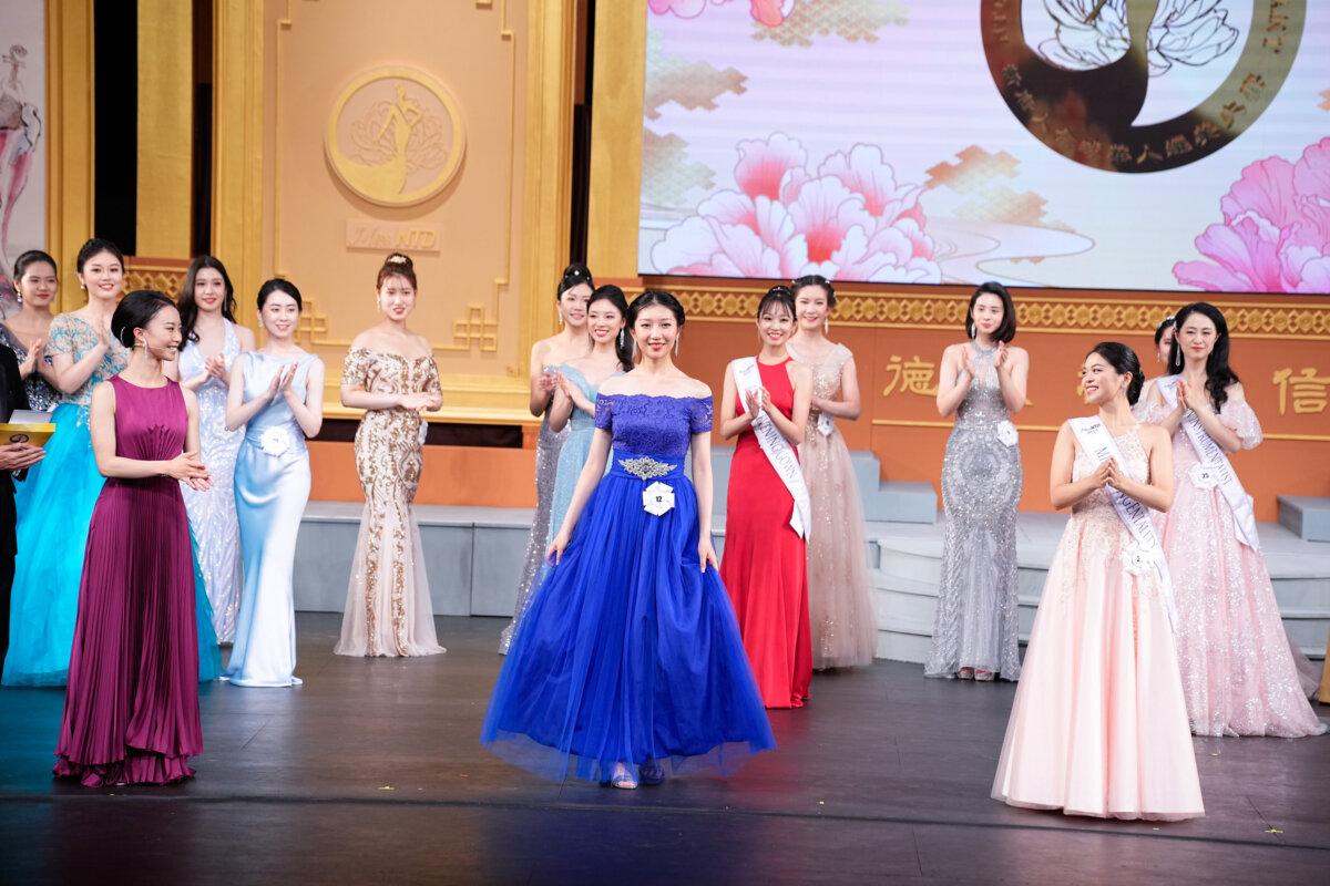 Wandi Zhu (C) in the evening wear portion of the inaugural NTD Global Chinese Beauty Pageant in Purchase, N.Y., on Sept. 30, 2023. (Larry Dye/The Epoch Times)