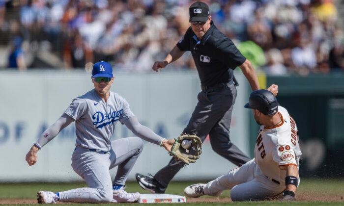 Dodgers Get Past Giants 5–2 for Another 100-Win Season
