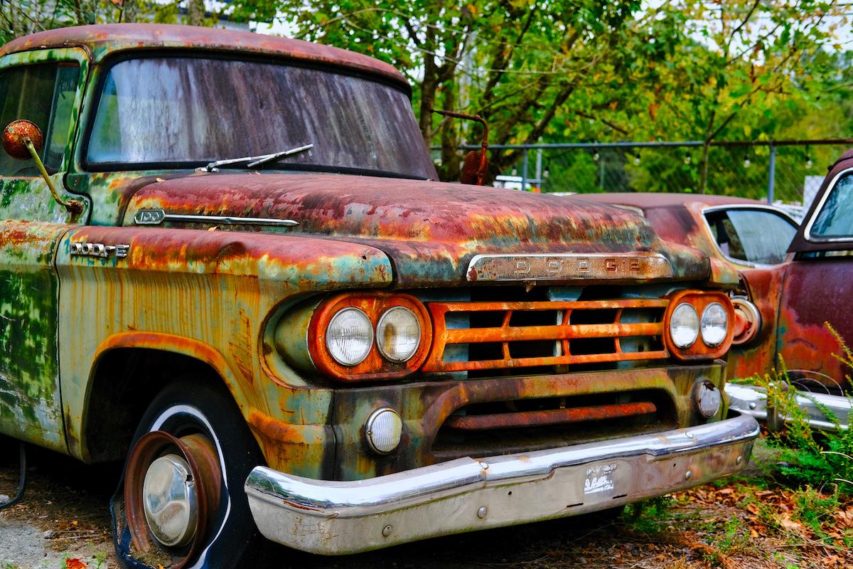 An old truck covered in rust sits on display at the junkyard museum, Old Car City, near White, Georgia (Darryl Brooks/Shutterstock)