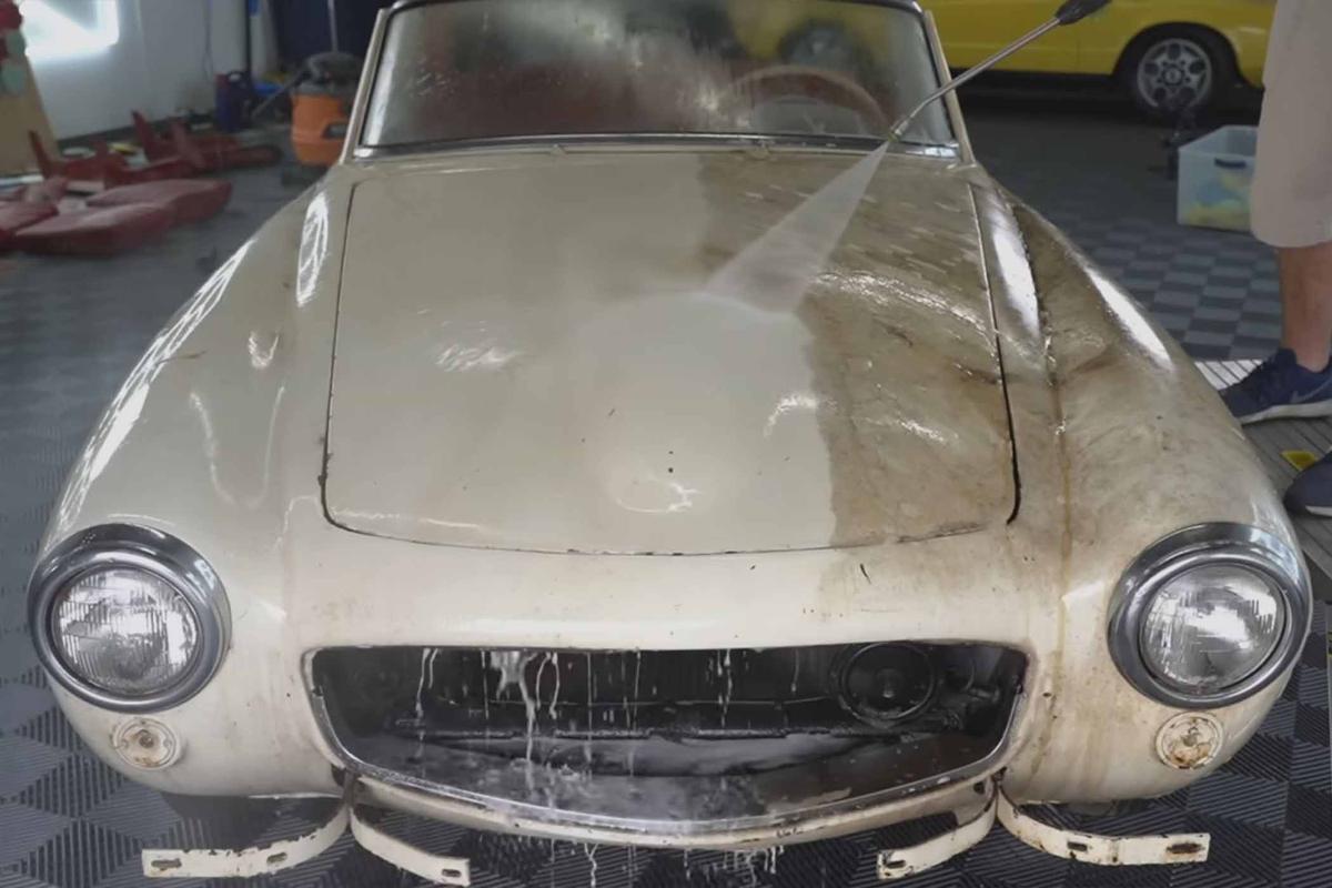 The Ohio detailers record video while pressure washing the 1955 Mercedes 190SL. (Courtesy of WD Detailing)