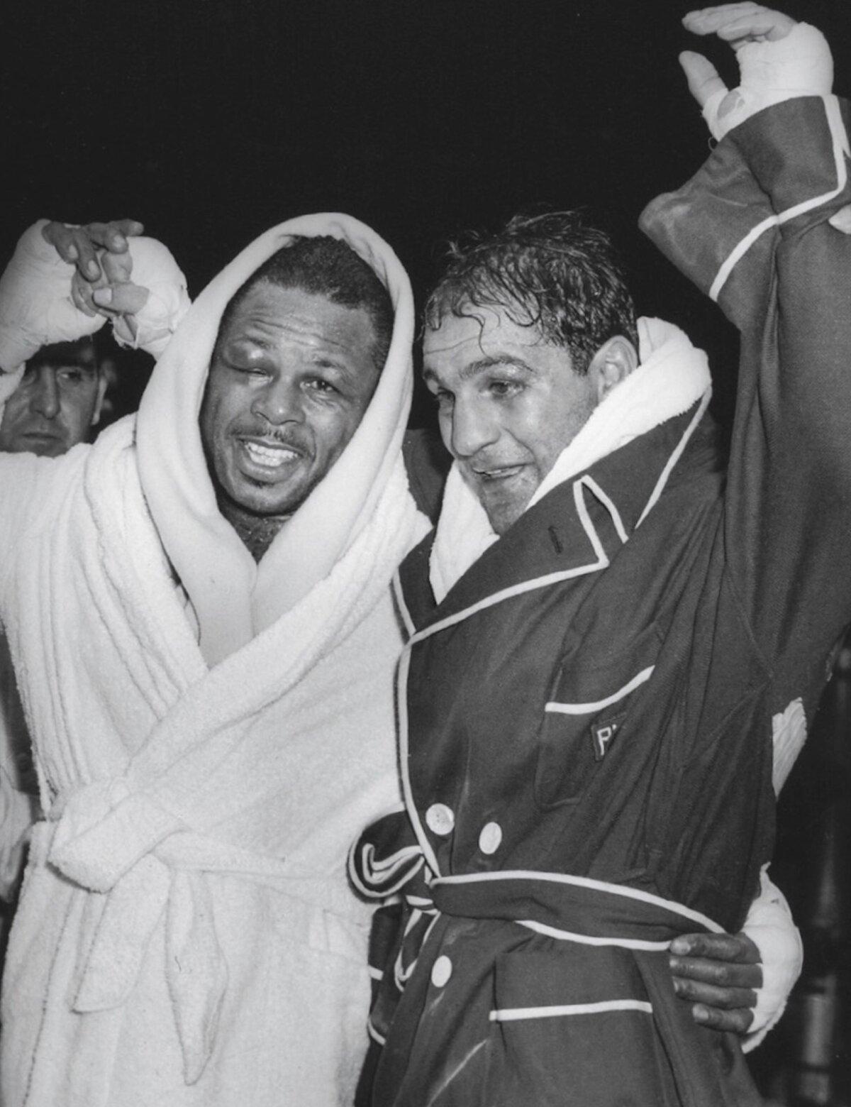 Keeping his title as heavyweight champion of the world, Marciano defeated Archie Moore on September 21, 1955. “Archie Moore and Rocky Marciano” photographed by Osvaldo Salas, 1956. Smithsonian American Art Museum, Washington. (Smithsonian American Art Museum)