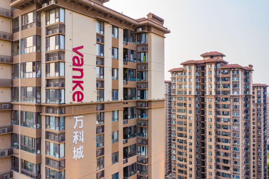 China’s Top Real Estate Giants Struggle with Debt, Vanke Faces Default