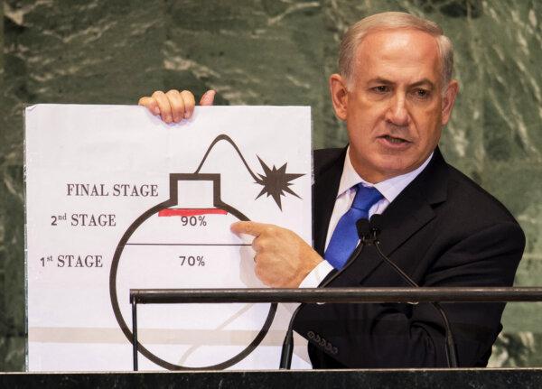 Israeli Prime Minister Benjamin Netanyahu uses a diagram of a bomb to describe Iran's nuclear program while delivering his address to the 67th United Nations General Assembly meeting, in New York, on September 27, 2012. (Don Emmert/AFP via Getty Images)
