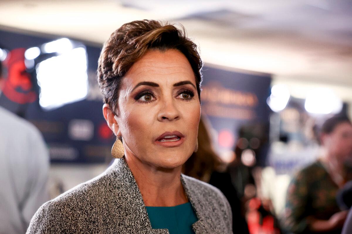 Kari Lake, former Republican candidate for governor of Arizona, talks to reporters in the spin room following the FOX Business Republican Primary Debate at the Ronald Reagan Presidential Library in Simi Valley, California, on Sept. 27, 2023. (Mario Tama/Getty Images)