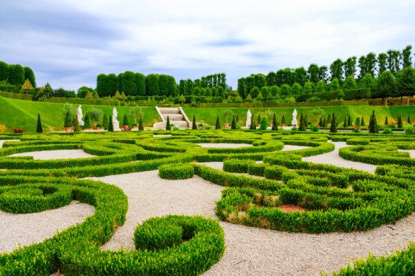 In 1720, landscape architect Johan Cornelius Krieger created this large Baroque-style symmetrical garden following the main axis of the castle, consisting of three main terraces, with straight lines and sharp angles to showcase the beauty in mankind’s control of nature. The garden features symmetrical box hedges, trimmed trees, sculptures, and flower beds. The lowest plateau features royal monograms of Frederik IV, Frederik V, Christian VI, and Margrethe II, designed in trimmed box hedges. (Jethro T/Shutterstock)