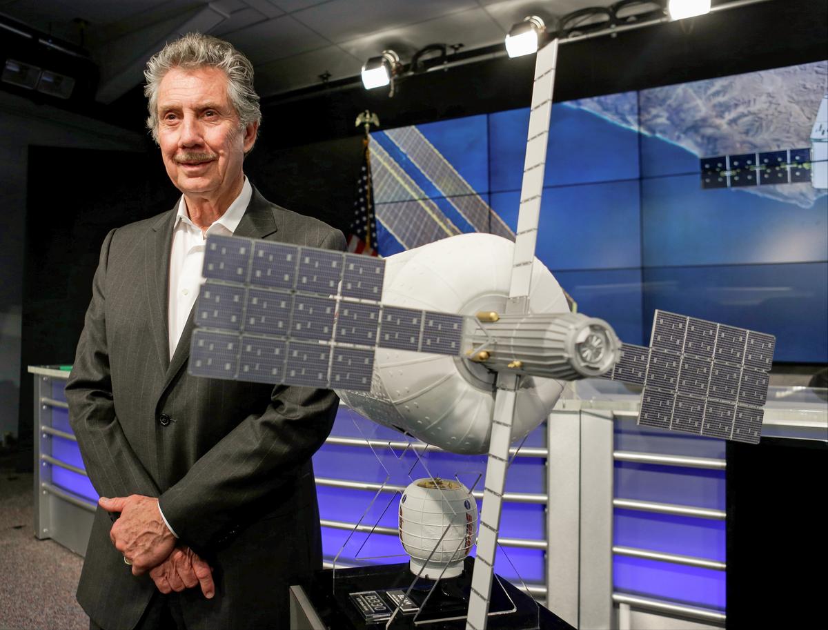 Robert Bigelow, founder and president of Bigelow Aerospace, stands next to a model of an inflatable habitat at the Kennedy Space Center in Cape Canaveral, Fla., on April 7, 2016. (AP Photo/John Raoux)