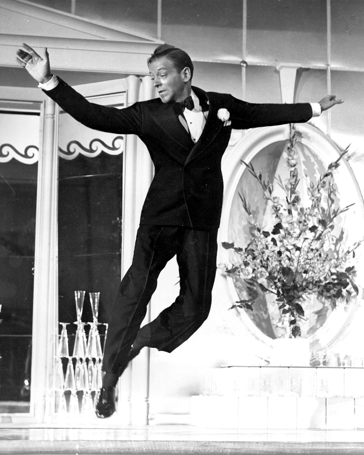 Fred Astaire dancing effortlessly in black-tie attire, in the 1943 film, "The Sky's the Limit." (MovieStillsDB)