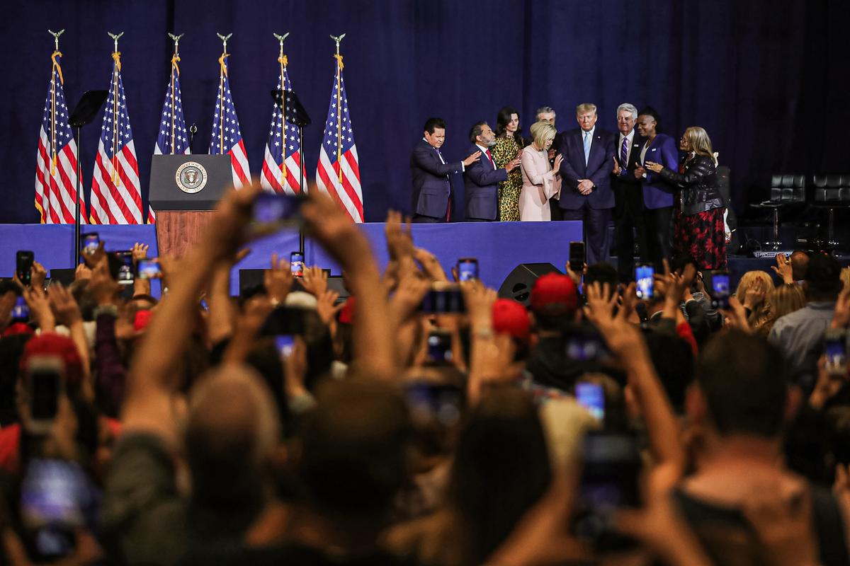 Faith leaders pray over President Donald Trump during an 'Evangelicals for Trump' campaign event held at the King Jesus International Ministry in Miami on Jan. 3, 2020. (Joe Raedle/Getty Images)