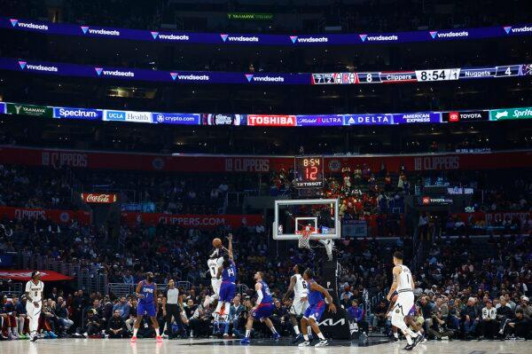 Reggie Jackson (7) of the Denver Nuggets takes a shot against the LA Clippers in the first half in Los Angeles on Nov. 27, 2023. (Ronald Martinez/Getty Images)
