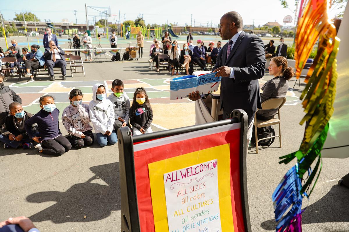 California State Superintendent of Schools Tony Thurmond reads from the book "Red: A Crayon's Story" to 2nd grade students at Nystrom Elementary School in Richmond, Calif., on May 17, 2022. Thurmond celebrated the donation of thousands of LGBT books from Gender Nation to 234 elementary schools in nine California districts. (Justin Sullivan/Getty Images)