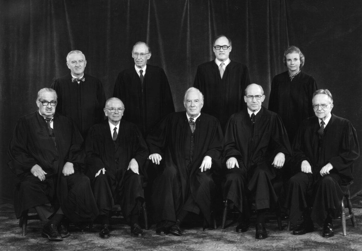 The nine members of the Supreme Court of the United States of America, (back row, from left) John Paul Stevens, Lewis F. Powell Jr., William Rehnquist, and Sandra Day O'Connor and (front row, from left) Thurgood Marshall, William J. Brennan Jr., Chief Justice Warren Burger, Byron White and Harry A Blackmun in 1983. (MPI/Getty Images)