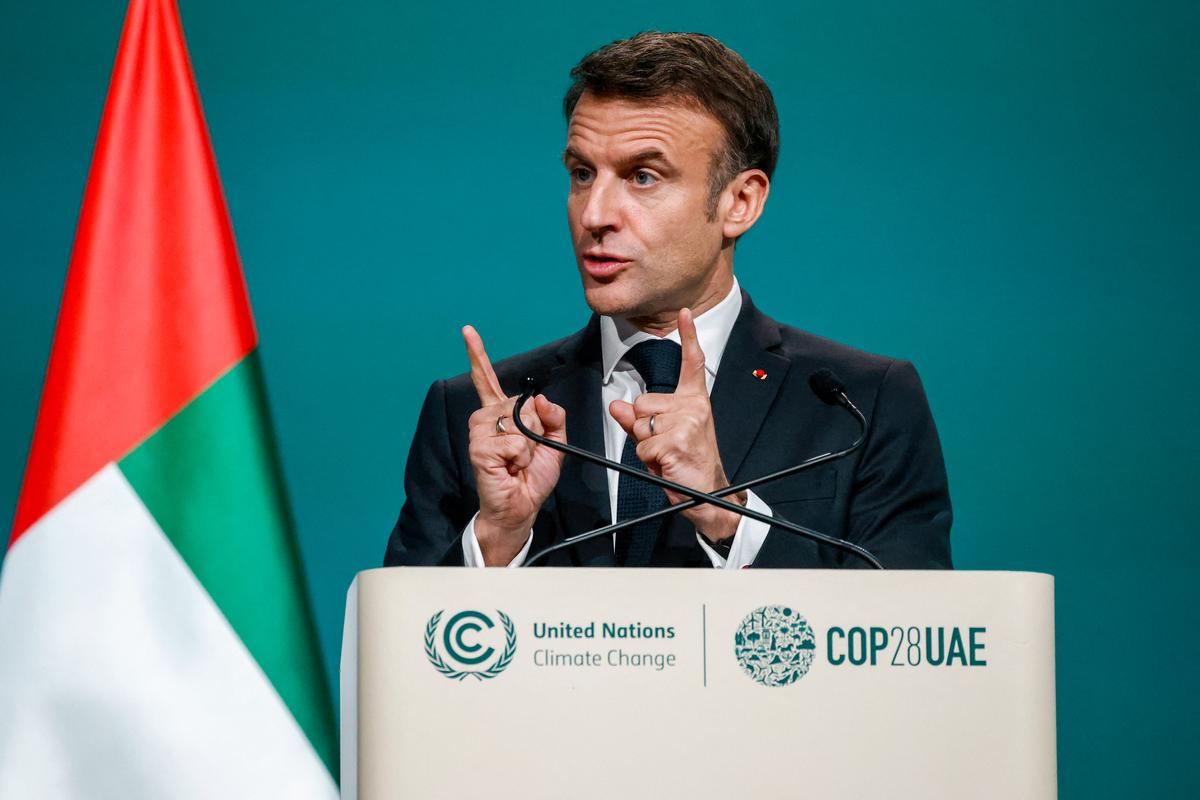 France's President Emmanuel Macron speaks during the United Nations climate summit in Dubai on Dec. 1, 2023. (LUDOVIC MARIN/AFP via Getty Images)