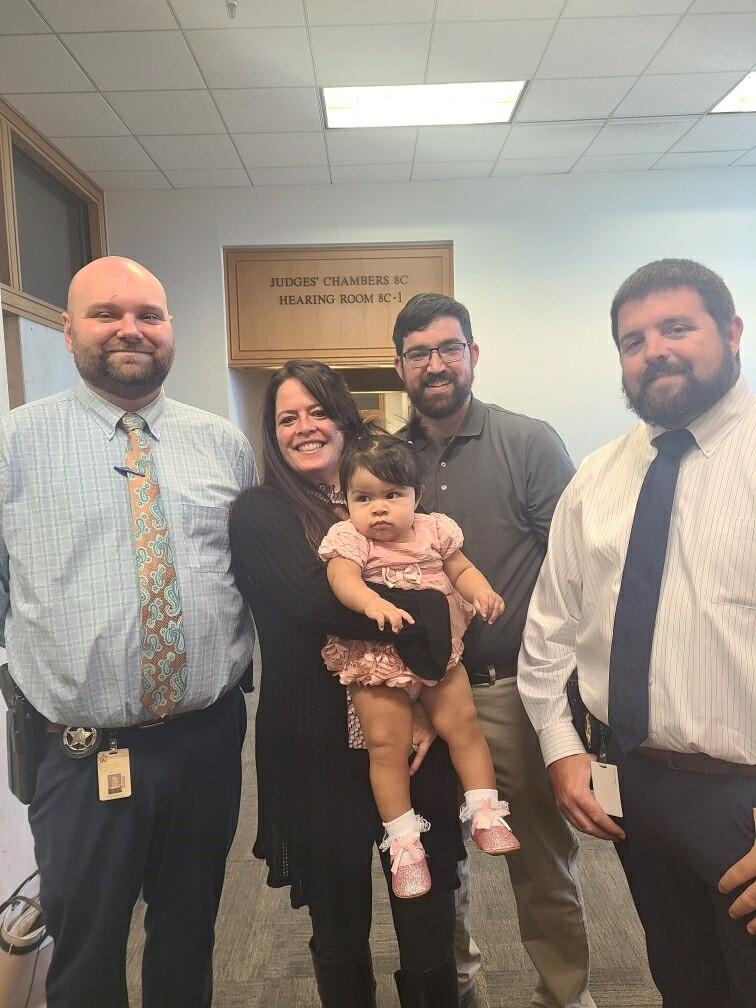 Angel Grace with her adoptive parents on Happy Gotcha Day. (Courtesy of Polk County Sheriff's Office)