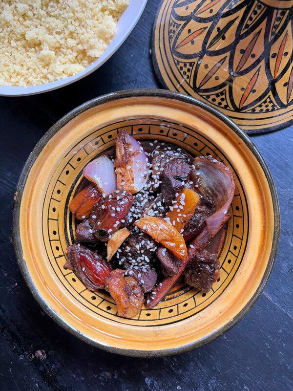 Dates, commonly known as the "bread of the desert" in the Middle East, give a sweet supporting hand to this easy lamb tagine. (Gretchen McKay/Pittsburgh Post-Gazette/TNS)