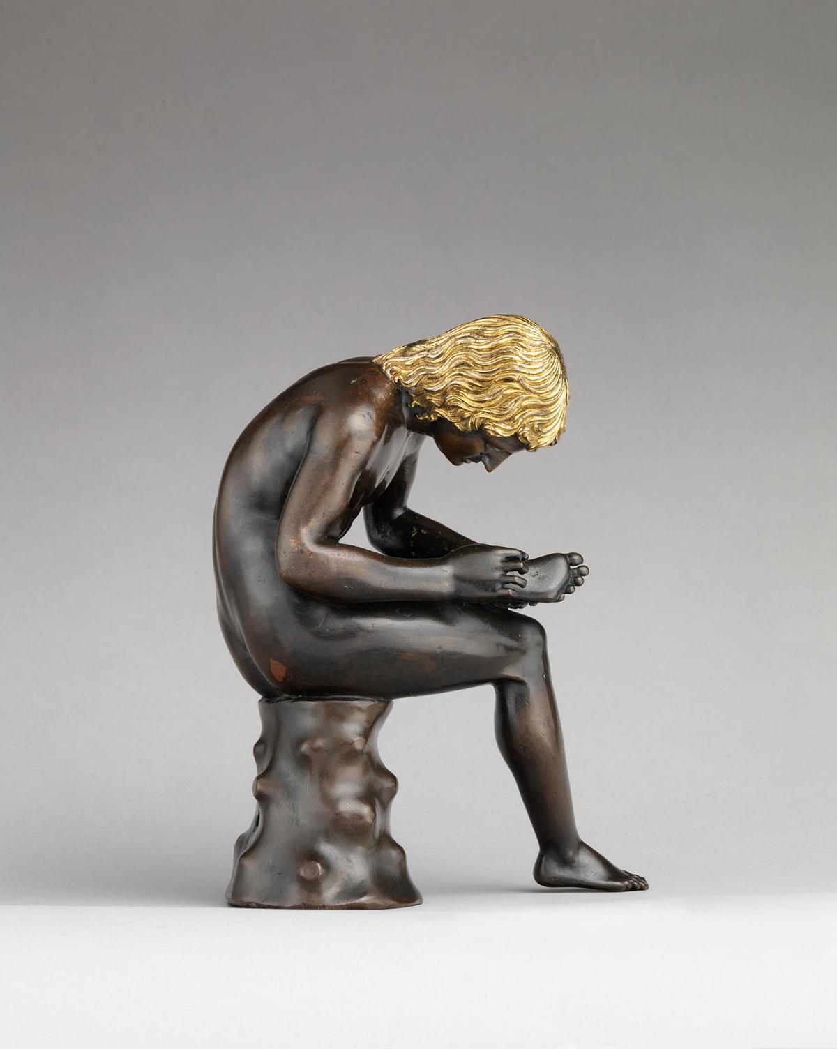 "Spinario" ("Boy Pulling a Thorn From His Foot"), circa 1501, by Antico. Bronze, partially gilt (hair) and silvered (eyes); 7 3/4 inches. The Metropolitan Museum of Art, New York City. (Public Domain)