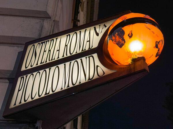 Sign above the Ristorante il Piccolo Mondo, showing its historic former full name. (Alan Behr/TNS)