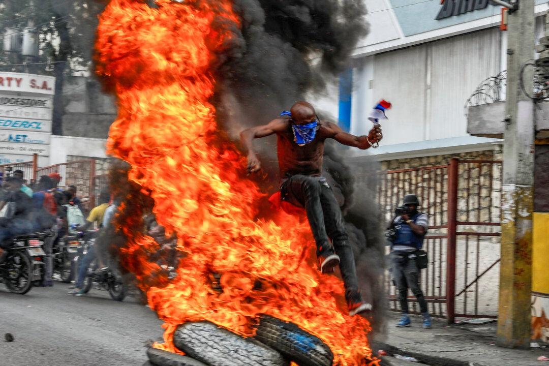 Protests Erupt Across Haiti as Demonstrators Demand That Prime Minister Resign