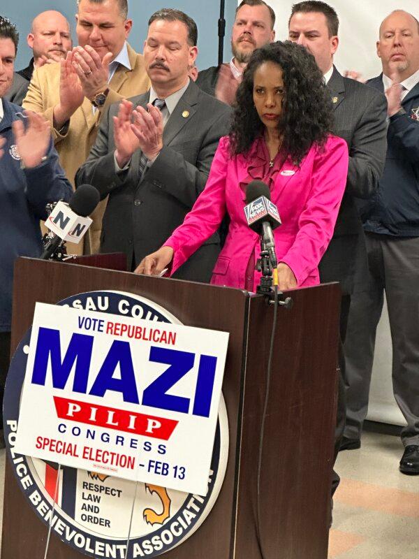 Tom Suozzi must defeat Mazi Pilip pictured here at the Nassau County PBA office on Feb. 9, 2024, with representatives from police unions that have endorsed her. (Courtesy of Juliette Fairley)