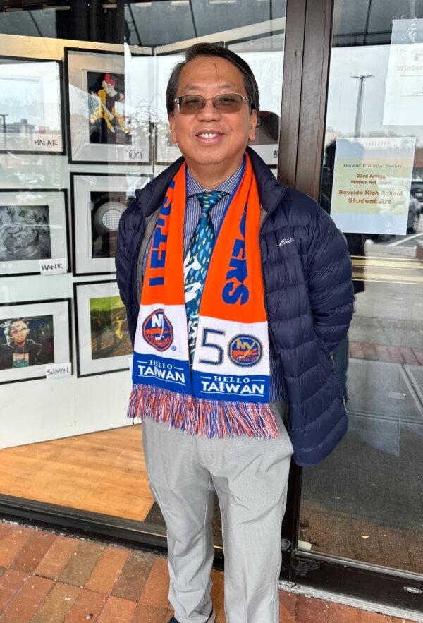 Ming Chiang outside of Tom Suozzi's campaign headquarters in Queens on Feb. 10, 2024.(Courtesy of Juliette Fairley)