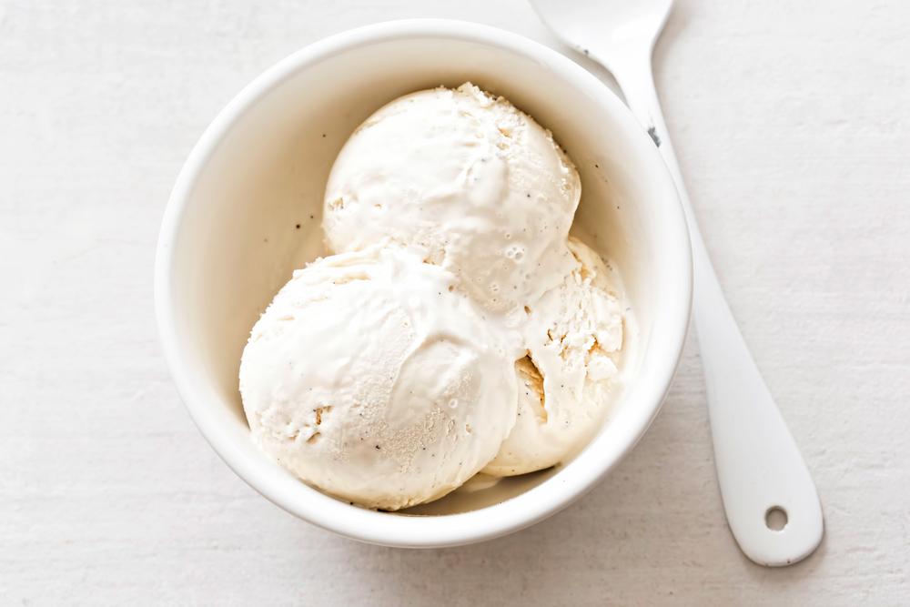 Whole vanilla bean ice cream is often considered a classic flavor and is popular both on its own and as a base for other desserts. (Bartosz Luczak/Shutterstock)
