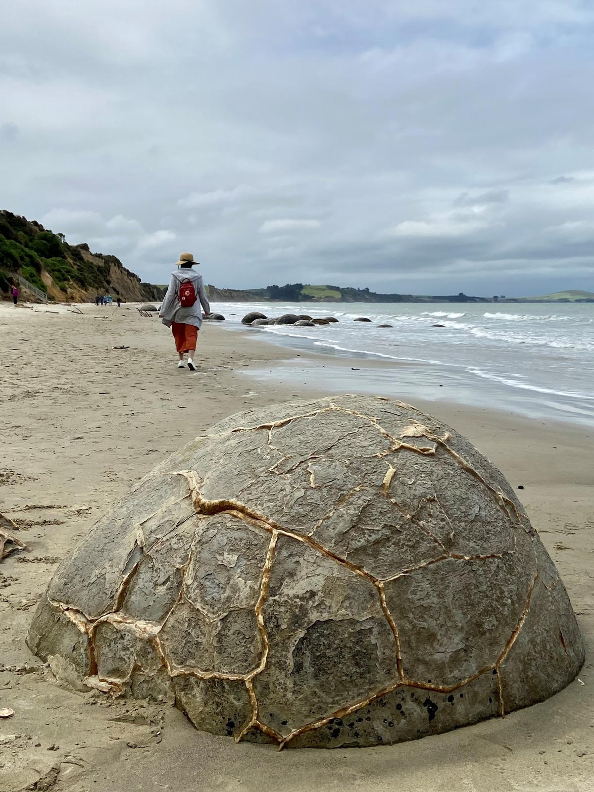 The Moeraki Boulders, unusually large spherical boulders spread out along a section of the Otago coast, in New Zealand on Dec. 6, 2022. (Daniel Teng/The Epoch Times)
