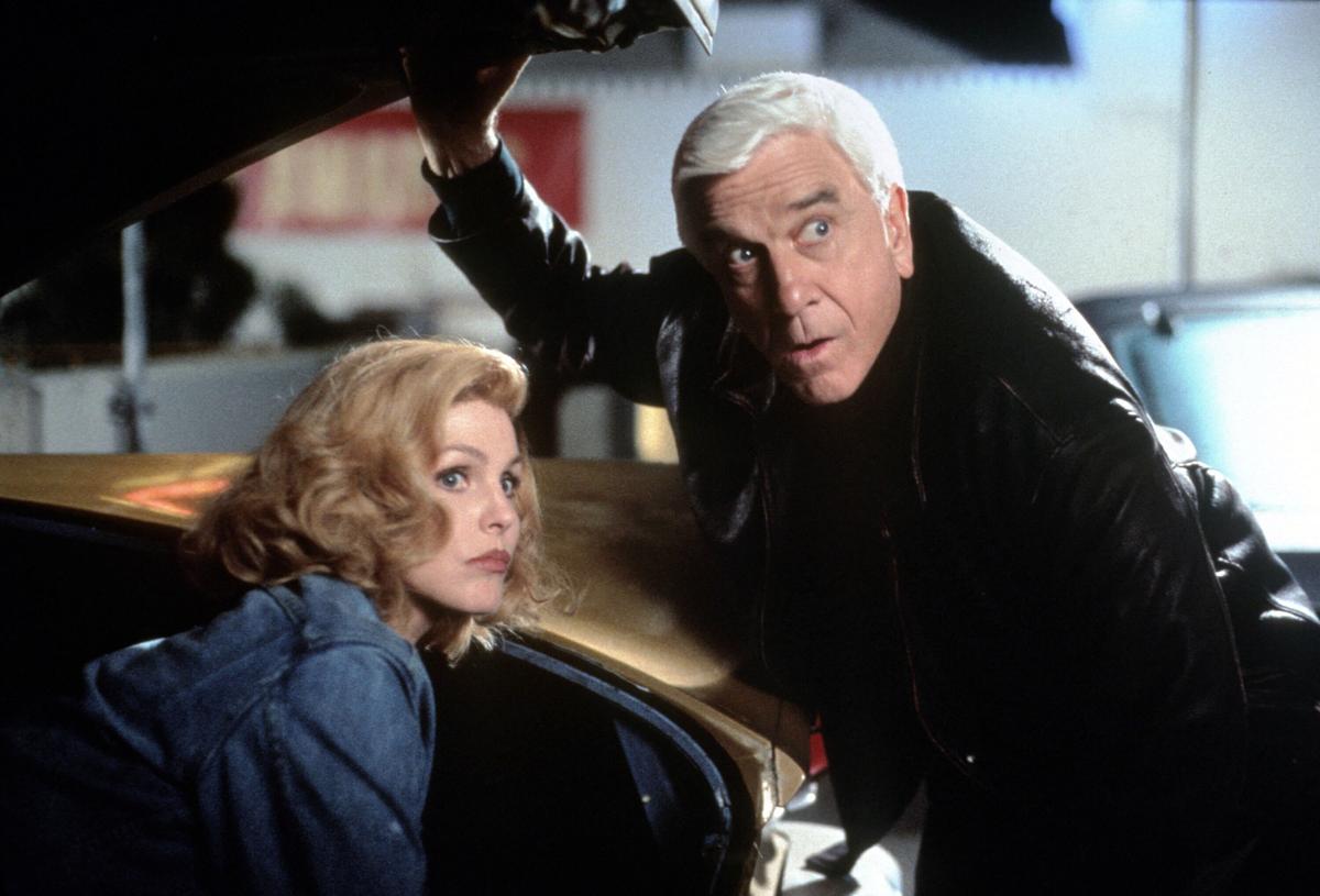 A scene from “Naked Gun 33 1/3: The Final Insult,” starring Nielsen and Priscilla Presley, who portrays Nielsen’s character’s wife. (MovieStillsDB)
