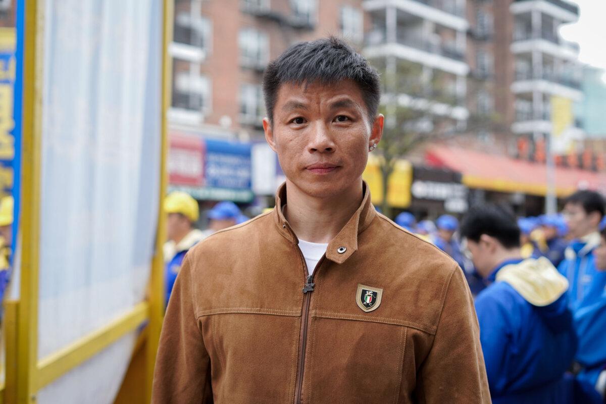 Chen Weijie at a rally calling for an end to the persecution in China of the spiritual discipline Falun Gong, in the Flushing neighborhood of Queens, New York, on April 21, 2024. (Chung I Ho/The Epoch Times)